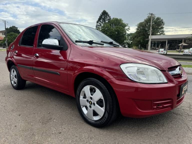 CHEVROLET - PRISMA - 2009/2009 - Vermelha - R$ 24.900,00