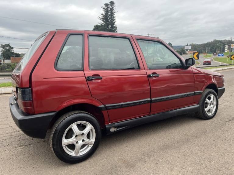 FIAT - UNO - 1997/1997 - Vermelha - R$ 9.700,00